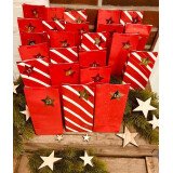 Adventskalender fertig gefüllt mit Geschenken 24...